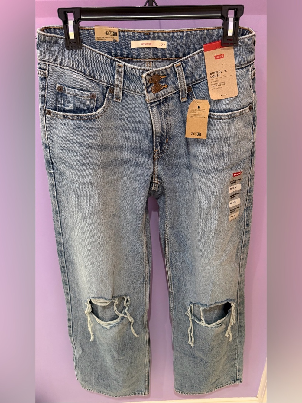 Levi's Women's Light Blue Straight Leg Distressed Superlow Loose Jeans